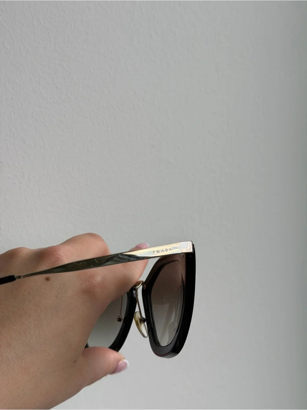 Prada Black Cat-Eye Sunglasses with Gradient Lenses